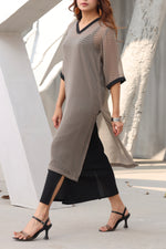 Polka dotted black dress