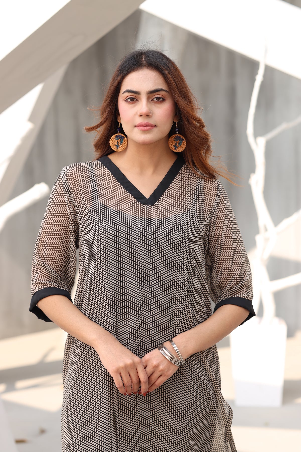 Polka dotted black dress